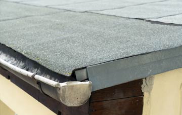 repair or replace Four Points flat roofing?